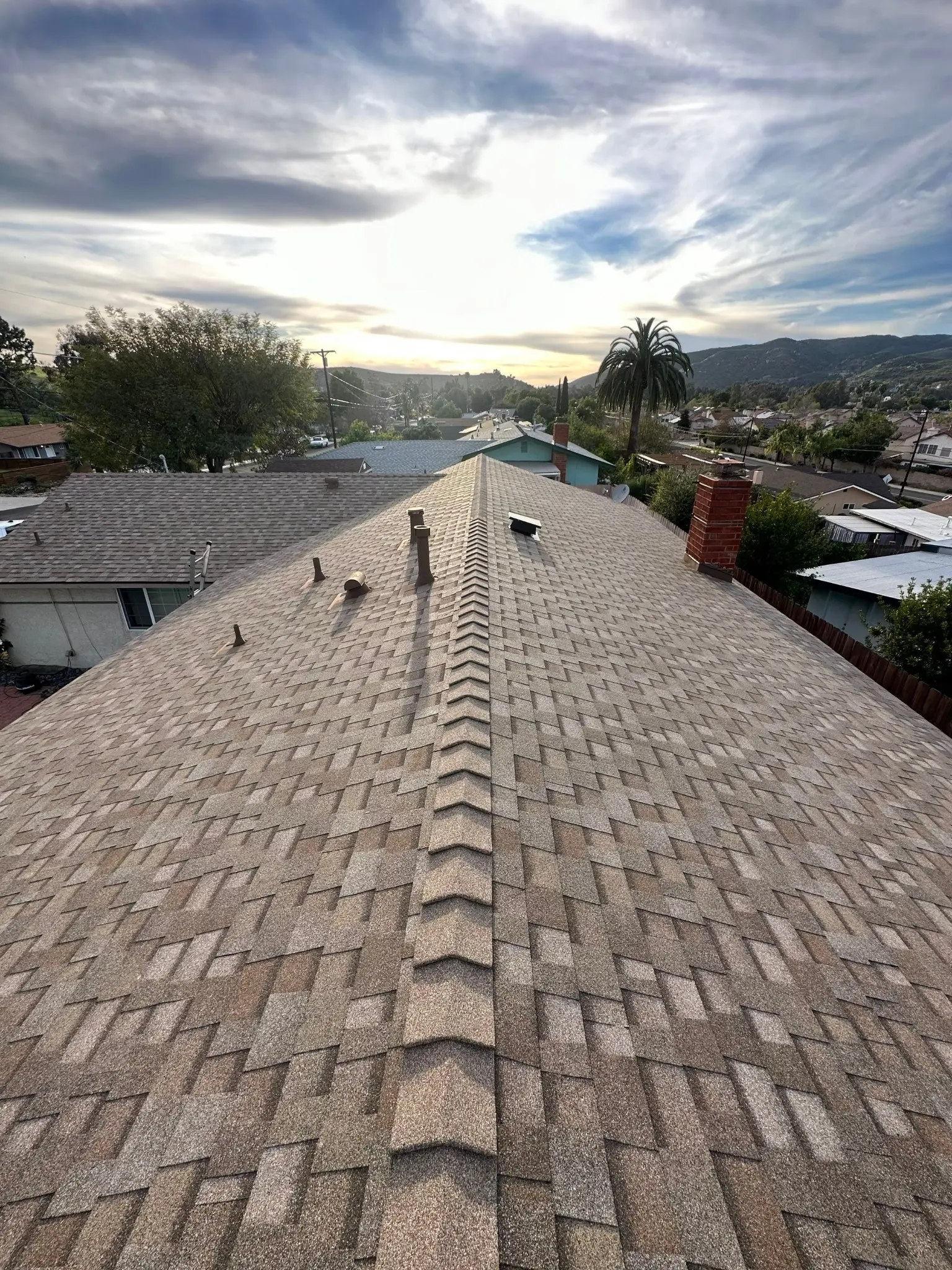 Completed Owens Corning Duration COOL shingle roof in Sand Castle