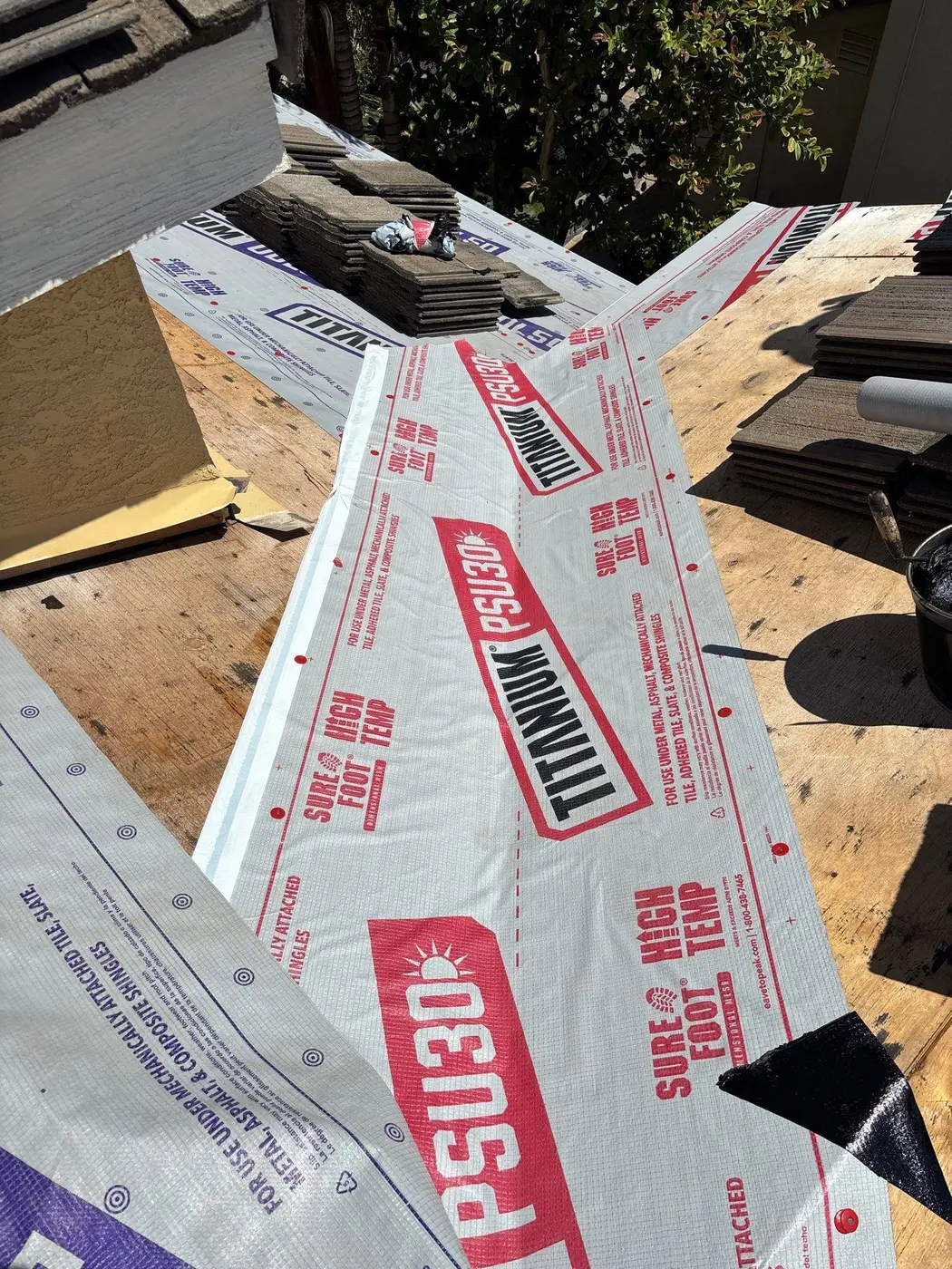 Titanium PSU30 self-adhered membrane installed through a tile roof valley
