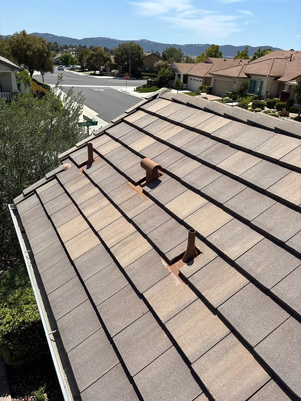 Completed concrete tile roof maintenance project in Murrieta
