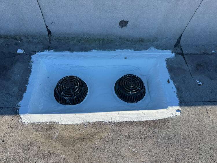 Flat roof drains clear of leaves after maintenance