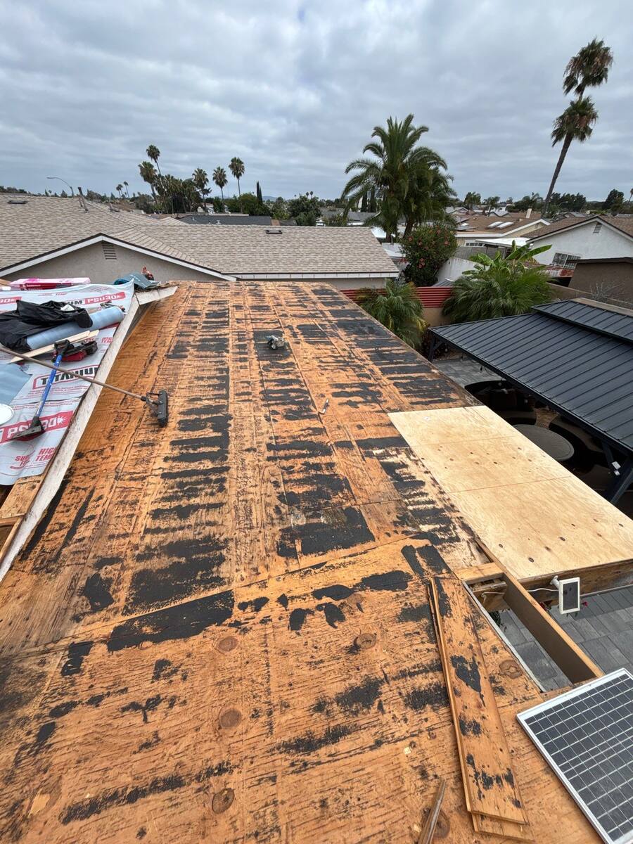 Low-slope roof deck exposed after existing roofing was removed