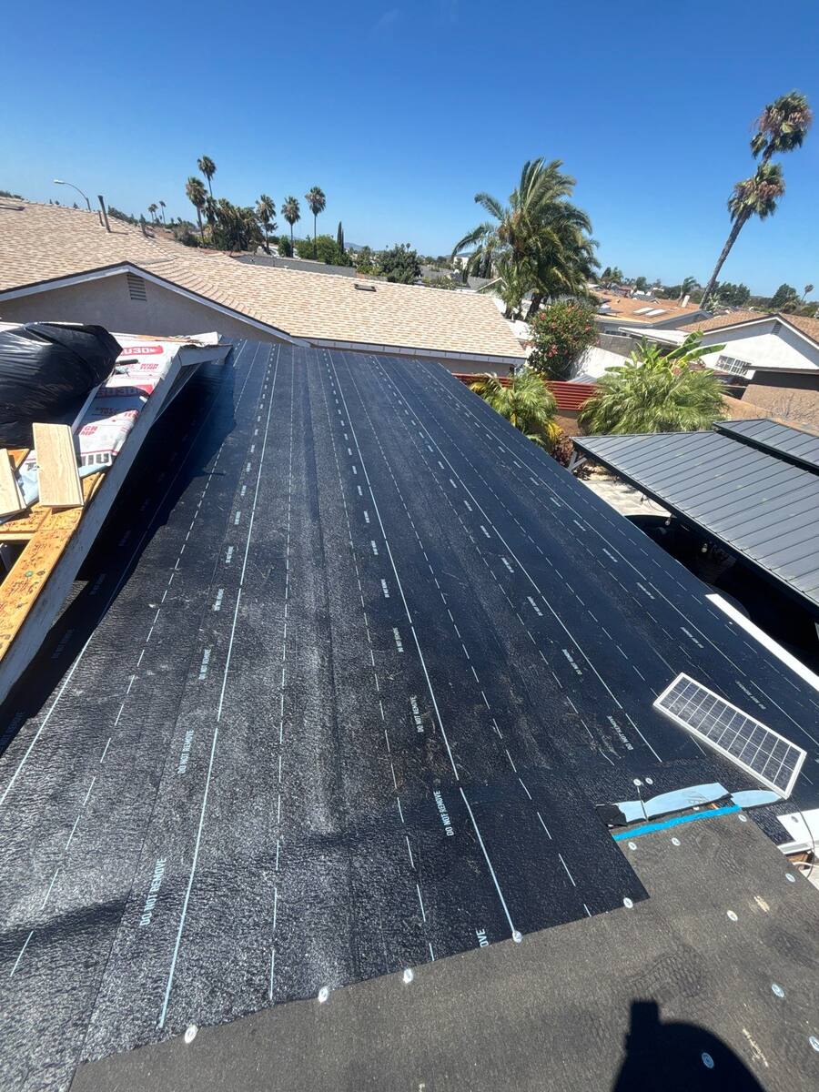 Self-adhered modified bitumen cap sheet installed on a low-slope roof