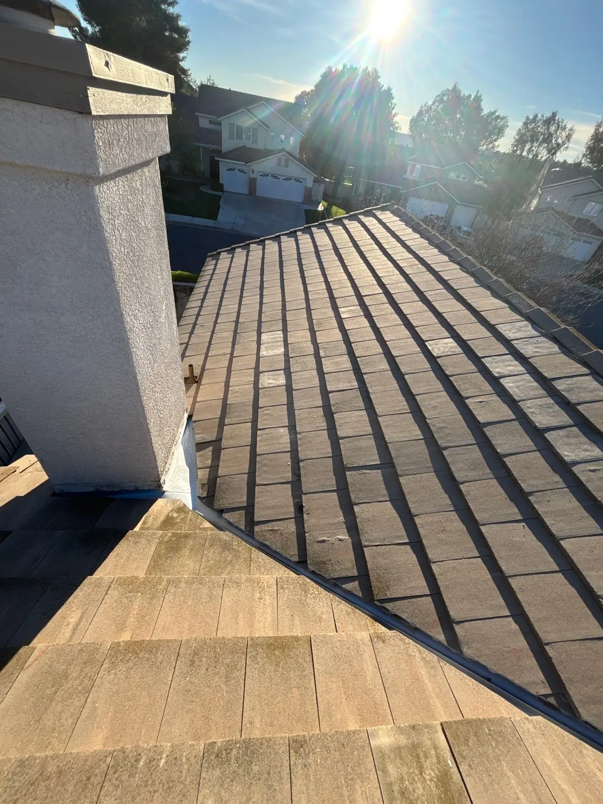 Completed tile roof chimney repair