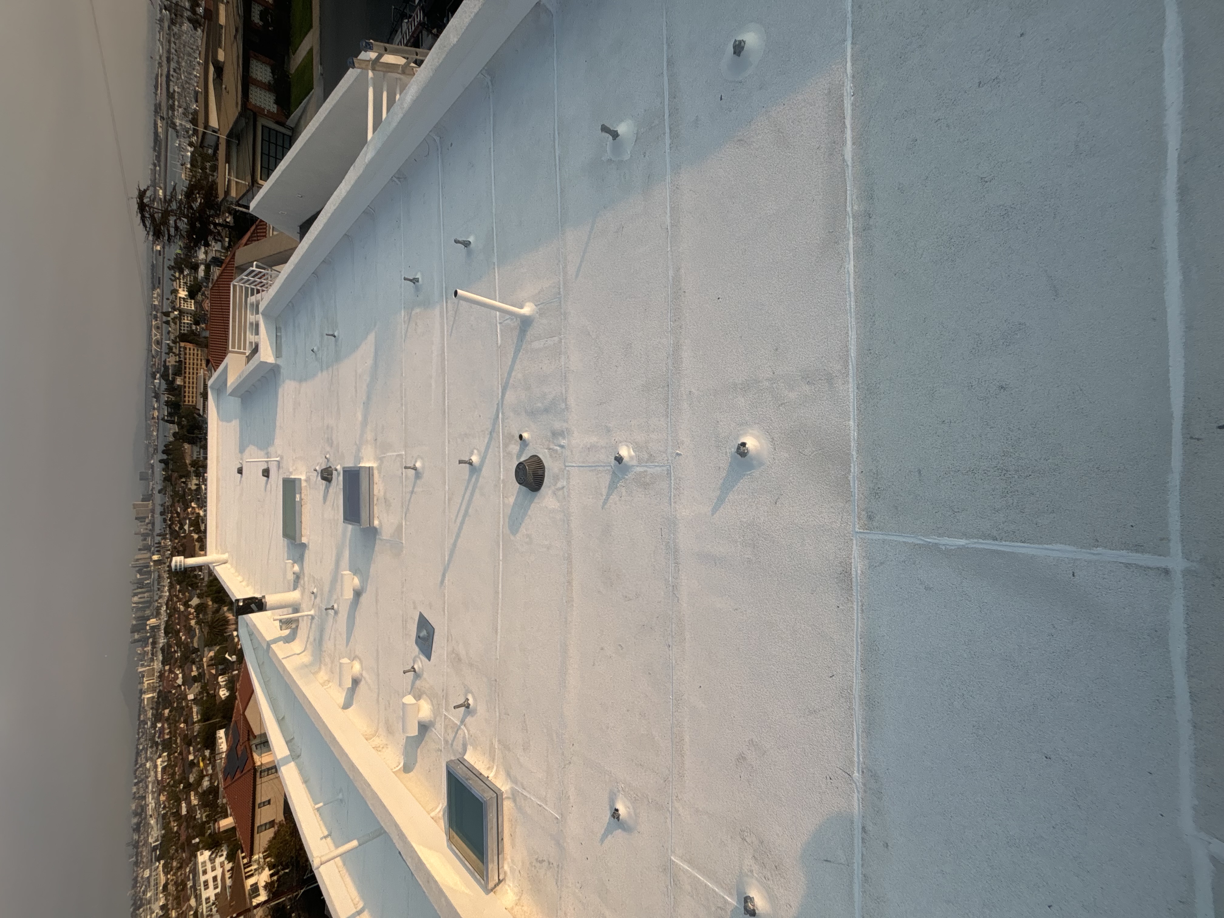 Torch-down roof installation in Point Loma—clean seams and cap sheet