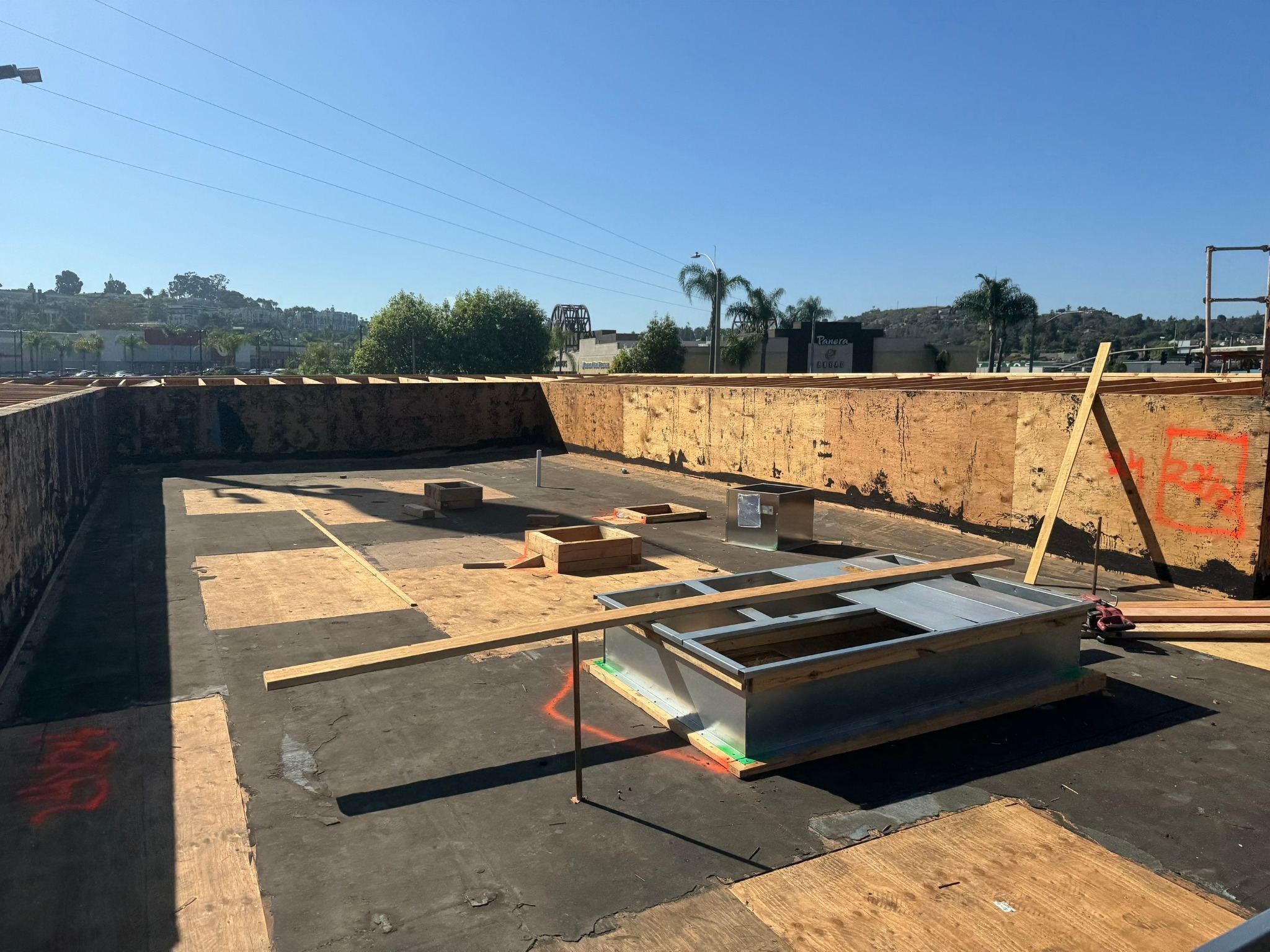 Commercial roof deck and curb preparation before TPO installation