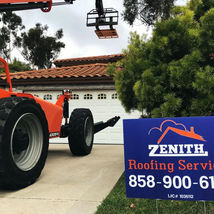 Zenith Roofing on-site forklift with company sign during job staging